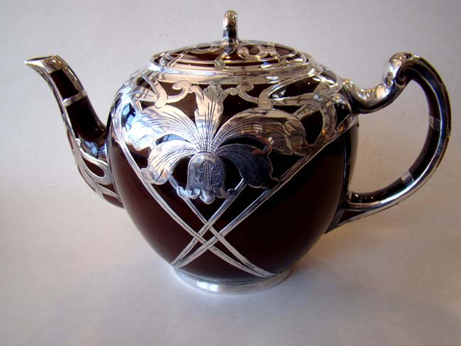 An absolutely stunning scarlet red ceramic teapot with unbelievable silver overlay circa 1890 — image 2